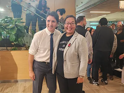 Tammy and Prime Minister Trudeau taking a picture at Mohawk College